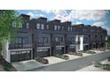 Rear view of townhomes showcasing attached garages and private balconies at 2427 Weddington Ave # 6, Charlotte, NC 28204