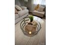 Stylish glass and metal coffee table with decor at 195 Edward Ave # 13, Concord, NC 28025