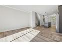 Bright and airy living room with hardwood floors and lots of natural light at 1432 Hamilton St # 14, Charlotte, NC 28206