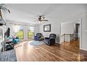 Living Room with hardwood floors, fireplace and two armchairs at 2721 Secrest Short Cut Rd, Monroe, NC 28110