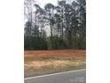 Cleared, vacant lot near wooded area at 187 Mccrary Rd, Mooresville, NC 28117
