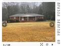Brick ranch house on a large lot at 12608 Rocky River Church Rd, Charlotte, NC 28215