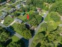 Aerial view showing the house's location in a residential neighborhood at 1890 Rhyneland Rd, Lincolnton, NC 28092