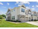 Two-story house with stone and siding exterior at 15609 Little Bluestem St, Charlotte, NC 28278