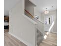 Bright entryway with staircase and view of kitchen at 107 Dublin Ct, Statesville, NC 28677