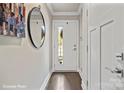 Bright and spacious entryway with hardwood floors at 3022 Loso Ter # 52, Charlotte, NC 28217