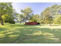 Large backyard with barn and open space at 5911 Mooresville Rd, Salisbury, NC 28147