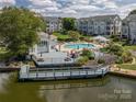 Community pool, clubhouse, and waterfront views at 18741 Nautical Dr # 101, Cornelius, NC 28031