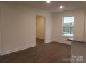 Simple dining room with hardwood floors and access to other rooms at 3910 Jenkins Rd, Clover, SC 29710
