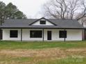 Newly built home with black roof and white siding at 3910 Jenkins Rd, Clover, SC 29710