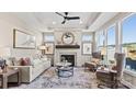 Spacious living room features a fireplace and ample natural light at 7567 Baybrooke Ln # 35, Harrisburg, NC 28075