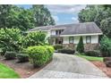 House with stone accents and landscaped front yard at 3208 Sedgefield Rd, Statesville, NC 28625