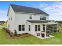 Two story home with a screened porch and patio at 315 Coronado Ave # 63, Matthews, NC 28104