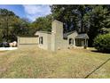 Newly painted light green brick ranch home with a chimney at 1762 Old Carter St, Lancaster, SC 29720