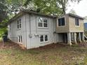 Ranch house with brick exterior, carport, and mature landscaping at 2102 Twin Ave, Gastonia, NC 28052