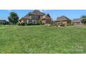 Large backyard with expansive green space at 312 Wintergreen Ct, Kings Mountain, NC 28086