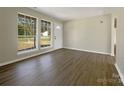 Living room with hardwood floors and large windows at 333 Irwin St, Rock Hill, SC 29730