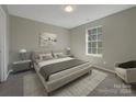 Primary bedroom with a king-size bed and neutral decor at 333 Irwin St, Rock Hill, SC 29730