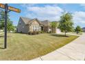 Charming home with stone and shingle exterior, and beautifully landscaped front yard at 3087 Bartlett St, Fort Mill, SC 29715