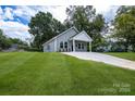 Charming craftsman style home with gray siding and a white trim at 920 Holmes St, Salisbury, NC 28144