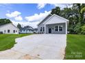 Newly built home with a concrete driveway at 920 Holmes St, Salisbury, NC 28144