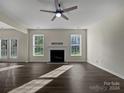 Spacious living room with fireplace and hardwood floors at 3309 Paxton Ridge Dr, Indian Trail, NC 28079