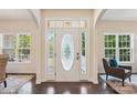 Bright entryway with hardwood floors and an oval-shaped door at 531 Tributary Dr # 26, Fort Lawn, SC 29714