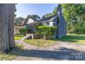 Gray house with a walkway leading to the front porch at 114 Gregg W St, Fort Mill, SC 29715