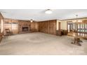 Spacious living room with brick fireplace and built-in shelving at 2017 And 2025 Filbert Hwy, York, SC 29745