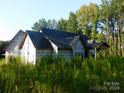 Under construction home with a large covered porch at 700 Bellegray Rd # 4, Clover, SC 29710
