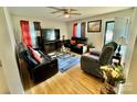 Relaxing living room with hardwood floors and recessed lighting at 836 S Cherry Rd, Rock Hill, SC 29732
