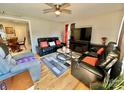 Living room with hardwood floors, comfy seating and a TV at 836 S Cherry Rd, Rock Hill, SC 29732
