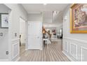 Bright and spacious entryway with hardwood floors and access to other rooms at 1229 Brecken Ct, Kannapolis, NC 28081