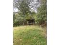 Mobile home nestled in a wooded area at 6134 Shirley Rd, Fort Lawn, SC 29714