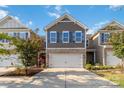 Modern two-story townhome with two-car garage at 2465 Palmdale Walk Dr, Fort Mill, SC 29708