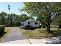 Small house with backyard at 110 Sims Pkwy, Harrisburg, NC 28075