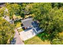 Aerial view of a charming house with a large backyard and a paved driveway at 607 Ligon St, Shelby, NC 28150