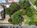 Aerial lot view of a house surrounded by trees at 225 Flint St, Charlotte, NC 28216