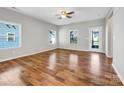 Living room with hardwood floors and access to patio at 24601 Blue Heron Cir, Lancaster, SC 29720