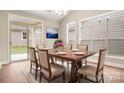 Bright dining room with hardwood floors and access to backyard at 829 C Wynnshire Dr # 57, Hickory, NC 28601
