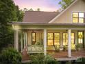 Spacious covered porch with wicker furniture at 534 Coman Ln, Kings Mountain, NC 28086