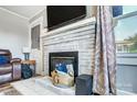 Cozy living room fireplace with a decorative mantel at 115 Abernathy St, Mount Holly, NC 28120