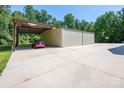 Covered carport attached to large shop building at 4215 Goodson Rd, Maiden, NC 28650