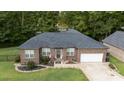 Brick ranch home with a large backyard and two car garage at 133 Ole Eastpointe Dr, York, SC 29745