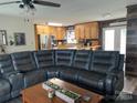 Spacious living room featuring a sectional sofa and kitchen views at 4040 Angus Dr, Gastonia, NC 28056