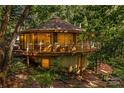 Unique circular home nestled in lush woods with deck at 241 Spring Shore Rd, Statesville, NC 28677