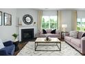 Living room with corner fireplace and plenty of natural light at 3898 Maxwell Henry Nw Ln, Conover, NC 28613