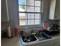 Kitchen sink with a view of the backyard at 916 Mcalway Rd # D, Charlotte, NC 28211