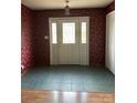 Front entry with tiled floor and floral wallpaper at 106 Dons Ct, Shelby, NC 28150