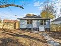 Private backyard with a fenced area and a concrete patio at 4319 Hovis Rd, Charlotte, NC 28208